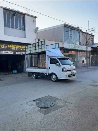 Açılır kanatlı kasa tentesi